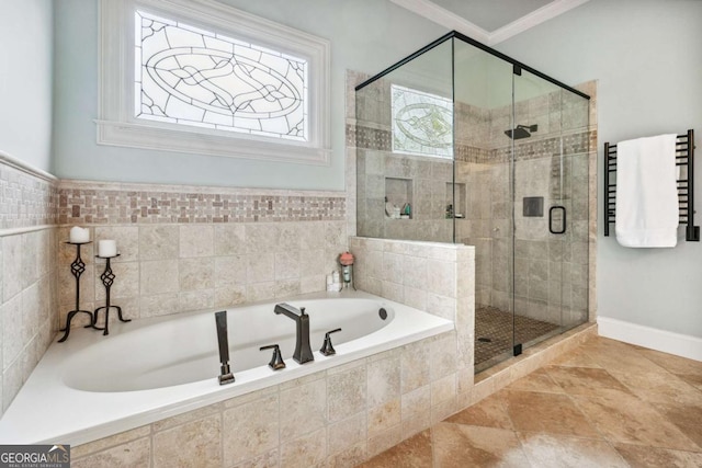 bathroom with independent shower and bath and crown molding