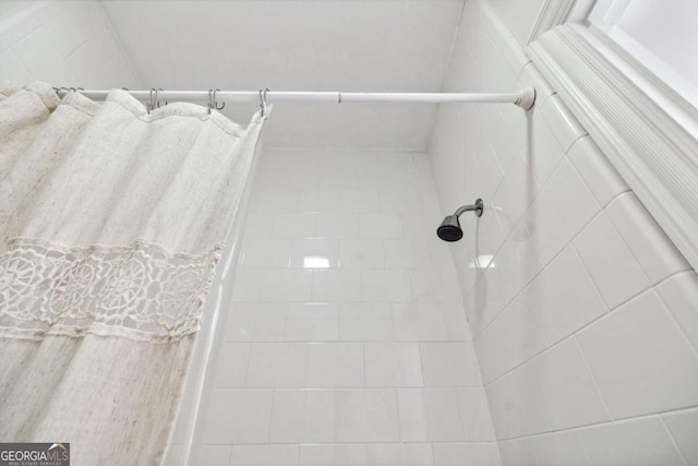 bathroom featuring walk in shower