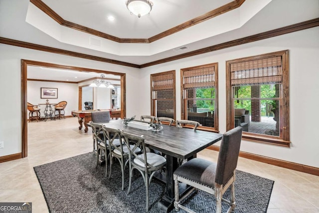 dining room featuring light tile patterned flooring, ornamental molding, a raised ceiling, and billiards