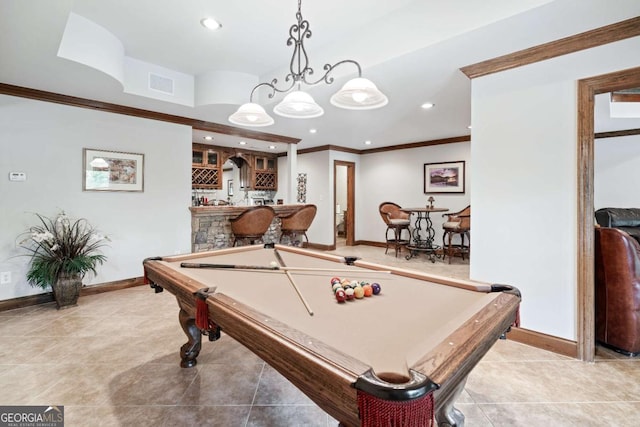 rec room with bar, light tile patterned floors, crown molding, and billiards