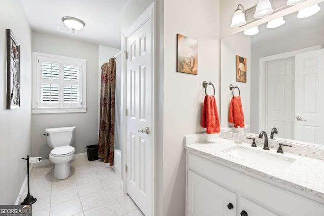 full bathroom featuring toilet, vanity, tile patterned floors, and shower / tub combo with curtain