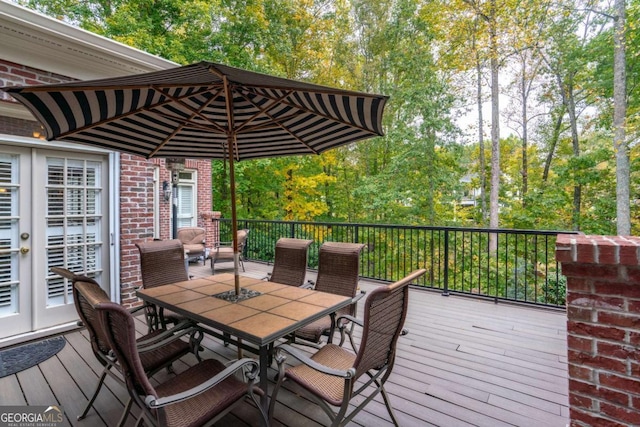 wooden deck featuring french doors