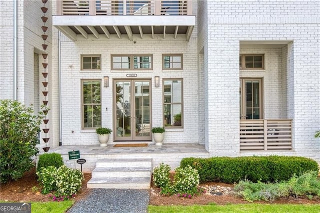 doorway to property featuring french doors