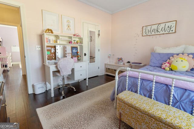 bathroom with toilet, crown molding, hardwood / wood-style floors, and vanity