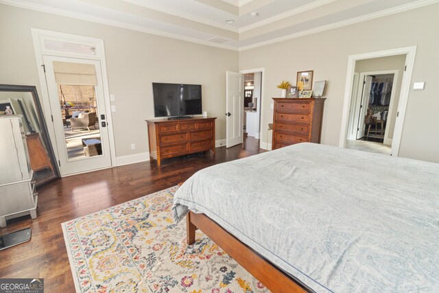 bathroom featuring an enclosed shower, vanity, toilet, and ornamental molding