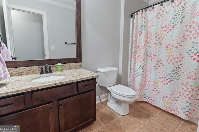 bathroom with toilet, crown molding, and vanity