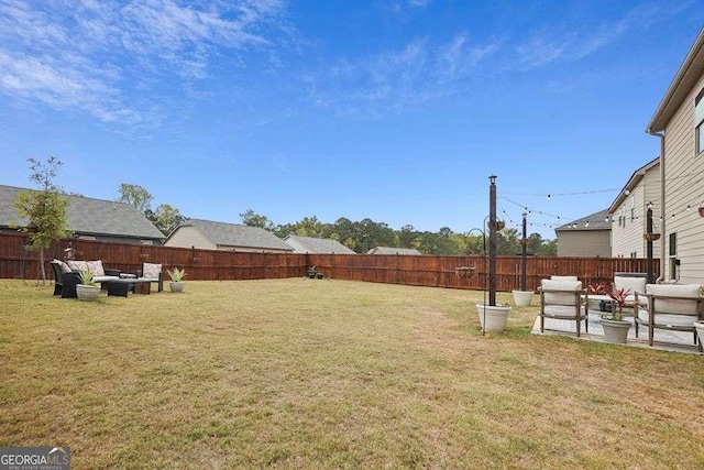 view of yard with an outdoor living space