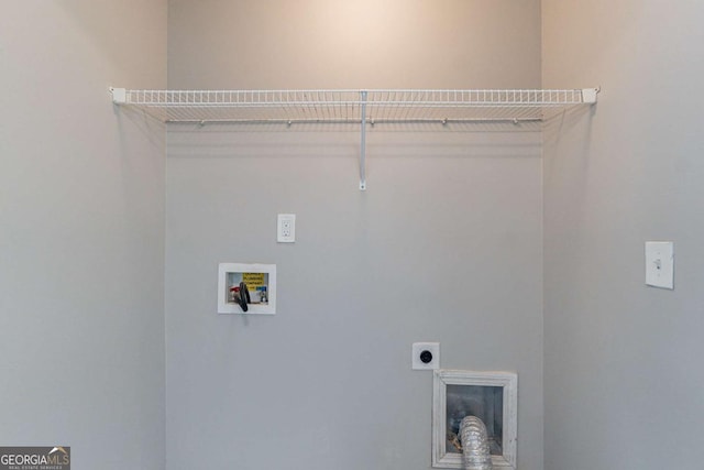 laundry area with hookup for a washing machine and electric dryer hookup