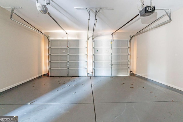 garage featuring a garage door opener