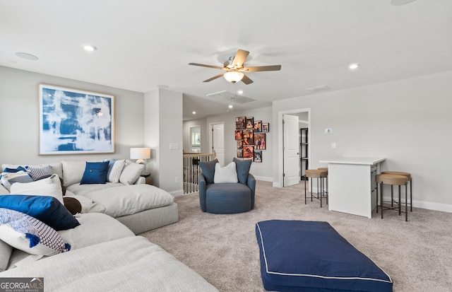 living room featuring light carpet and ceiling fan