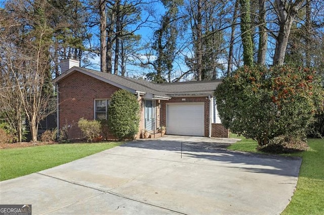 single story home featuring a garage and a front yard