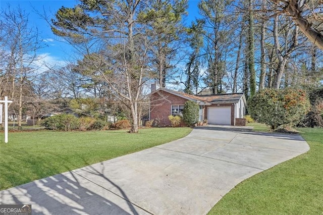 ranch-style home with a front lawn and a garage