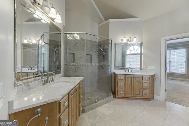 bathroom with an enclosed shower, vanity, tile patterned flooring, and ornamental molding