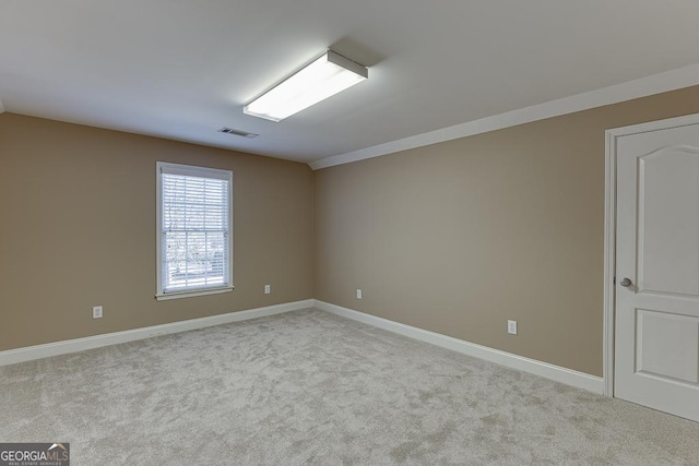 view of carpeted spare room