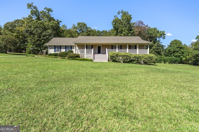 single story home with a front yard and a porch