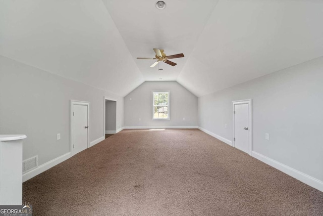 bonus room featuring carpet floors, vaulted ceiling, and ceiling fan