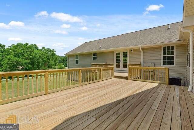 wooden deck with french doors