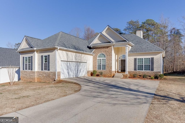 front of property with a garage