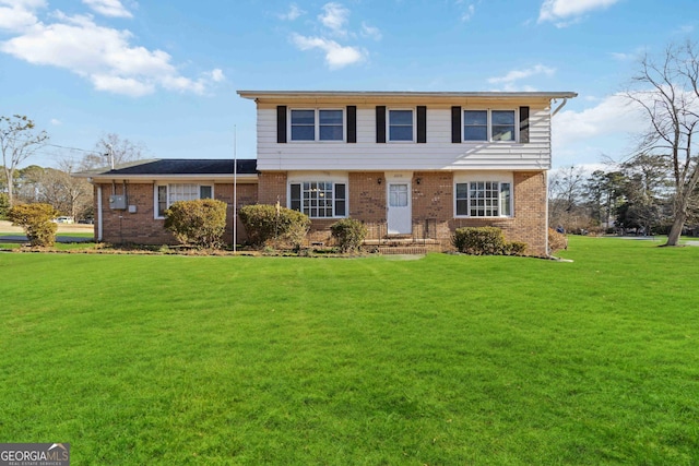 view of front of home featuring a front lawn