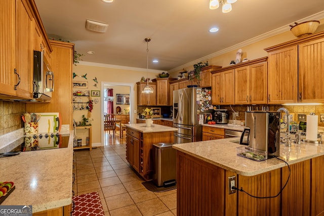 kitchen featuring tasteful backsplash, a kitchen island, ornamental molding, stainless steel appliances, and light tile patterned floors