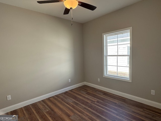 unfurnished room with ceiling fan, plenty of natural light, and dark hardwood / wood-style floors