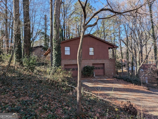 view of property exterior with a garage