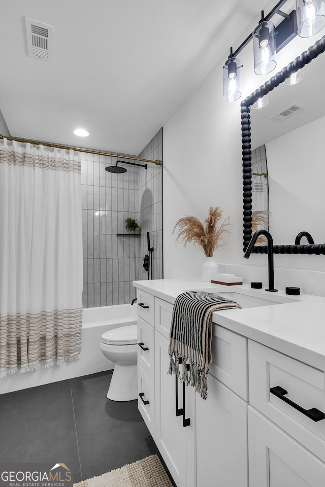 full bathroom featuring vanity, tile patterned flooring, toilet, and shower / bath combo