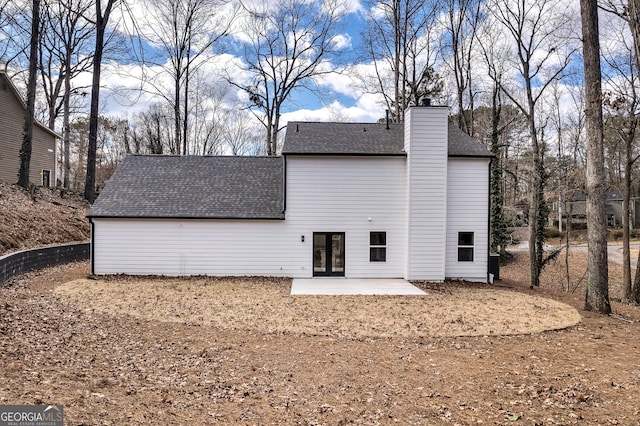 rear view of property with a patio area