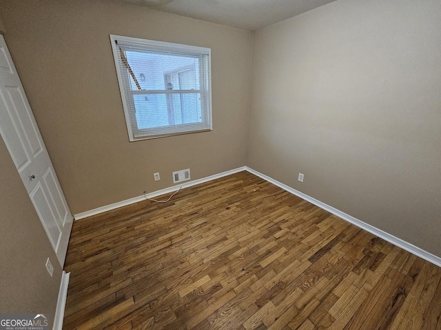 interior space with dark hardwood / wood-style floors