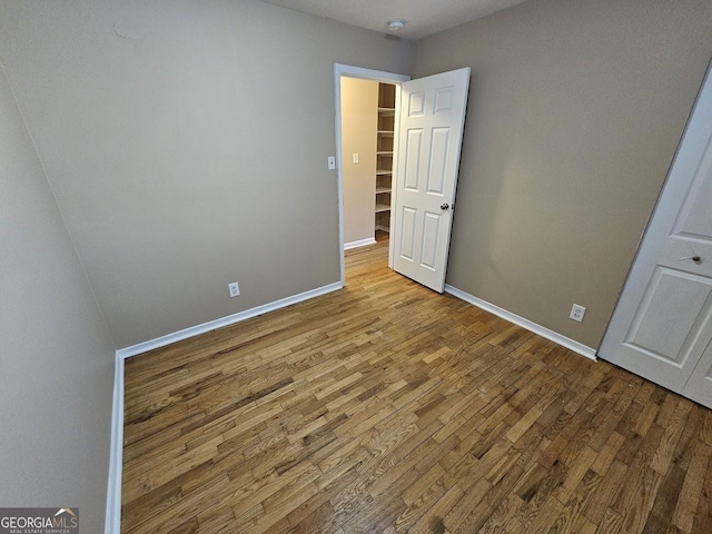 unfurnished bedroom with light hardwood / wood-style floors