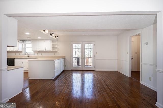 49 Post Oak Dr, Lagrange, GA 30240 - kitchen featuring open shelves, white cabinetry, dishwasher, light countertops, and dark wood-type flooring