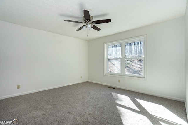 49 Post Oak Dr, Lagrange, GA 30240 - spare room with carpet floors, a ceiling fan, and baseboards