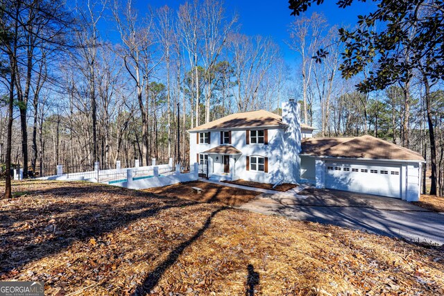 view of property exterior with a garage