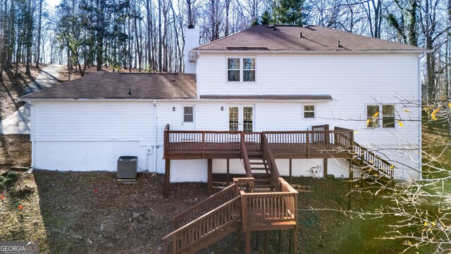 exterior space featuring central AC and a wooden deck