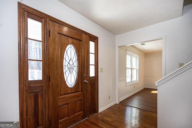 49 Post Oak Dr, Lagrange, GA 30240 - entrance foyer with dark wood-style floors, baseboards, and a textured ceiling