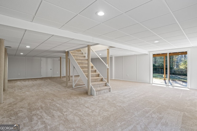 basement with light colored carpet