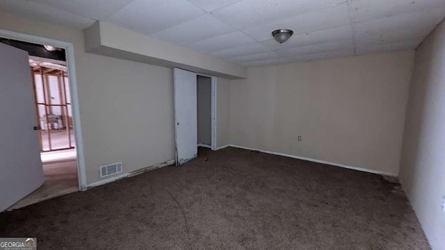 interior space with dark colored carpet