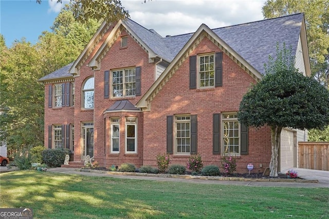 view of front of property with a front lawn