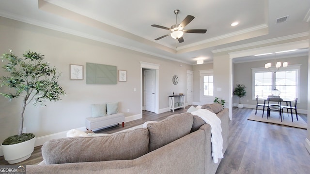 1013 Syrup Mill Creek Ln, Cairo, GA 39828 - living area with visible vents, a raised ceiling, and wood finished floors