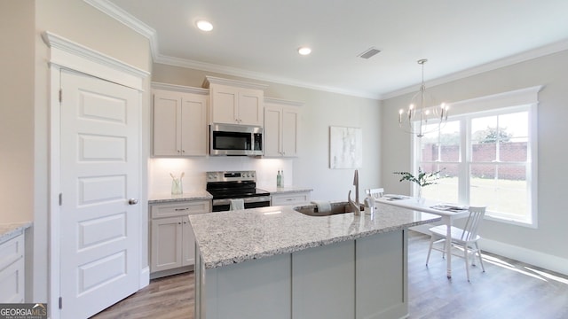 1013 Syrup Mill Creek Ln, Cairo, GA 39828 - kitchen with visible vents, crown molding, appliances with stainless steel finishes, an inviting chandelier, and a sink
