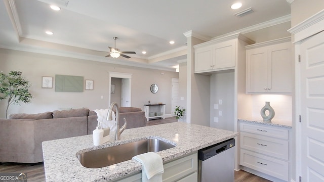 1013 Syrup Mill Creek Ln, Cairo, GA 39828 - kitchen with visible vents, a sink, stainless steel dishwasher, a raised ceiling, and open floor plan