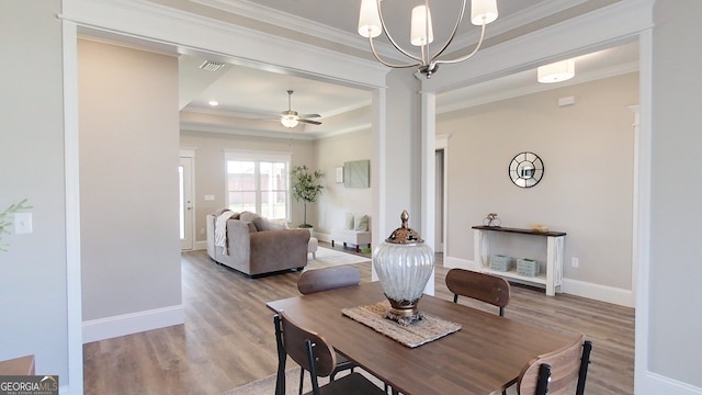 1013 Syrup Mill Creek Ln, Cairo, GA 39828 - dining room with visible vents, wood finished floors, and ornamental molding
