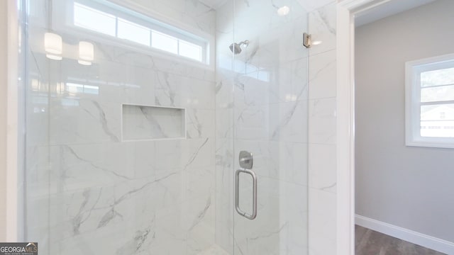 1013 Syrup Mill Creek Ln, Cairo, GA 39828 - full bath with a healthy amount of sunlight, a stall shower, and baseboards