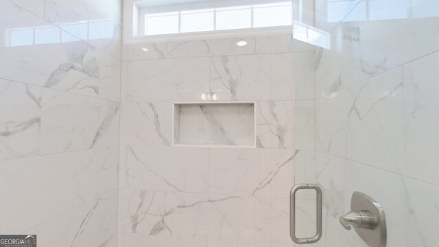 1013 Syrup Mill Creek Ln, Cairo, GA 39828 - bathroom featuring a tile shower