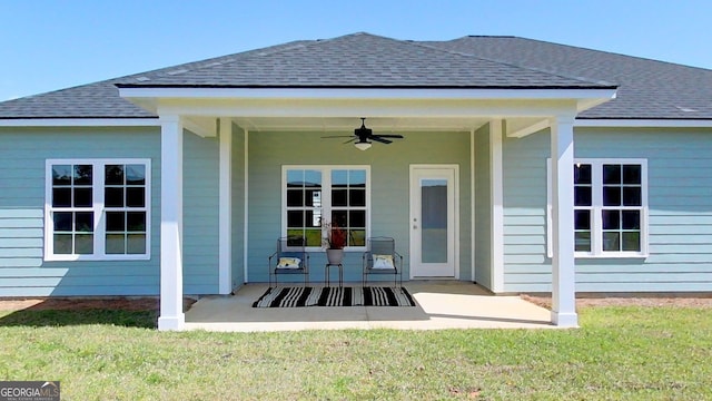 1013 Syrup Mill Creek Ln, Cairo, GA 39828 - exterior space featuring roof with shingles, french doors, a yard, a ceiling fan, and a patio