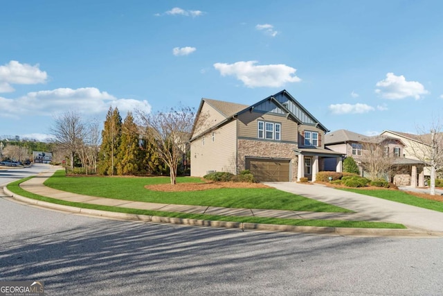 view of front facade featuring a garage and a front lawn