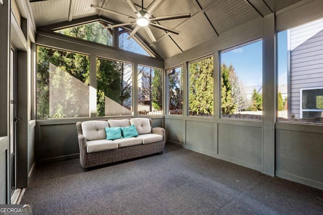 unfurnished sunroom with wooden ceiling, a wealth of natural light, and vaulted ceiling