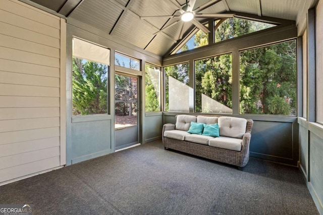 unfurnished sunroom with wood ceiling, lofted ceiling, and ceiling fan