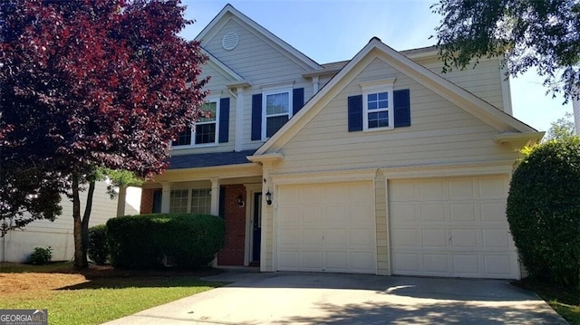 view of front of property featuring a garage