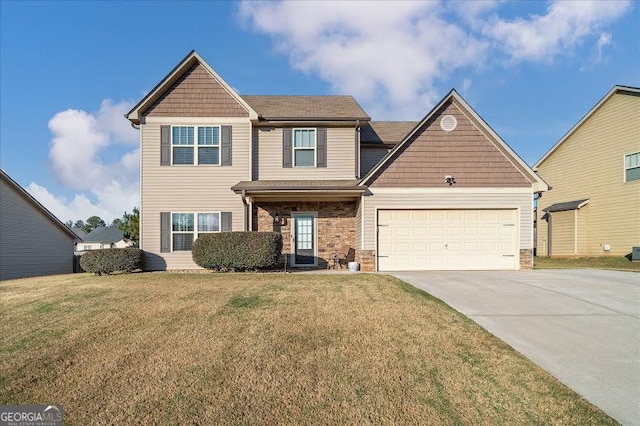 view of front of house featuring a garage and a front lawn